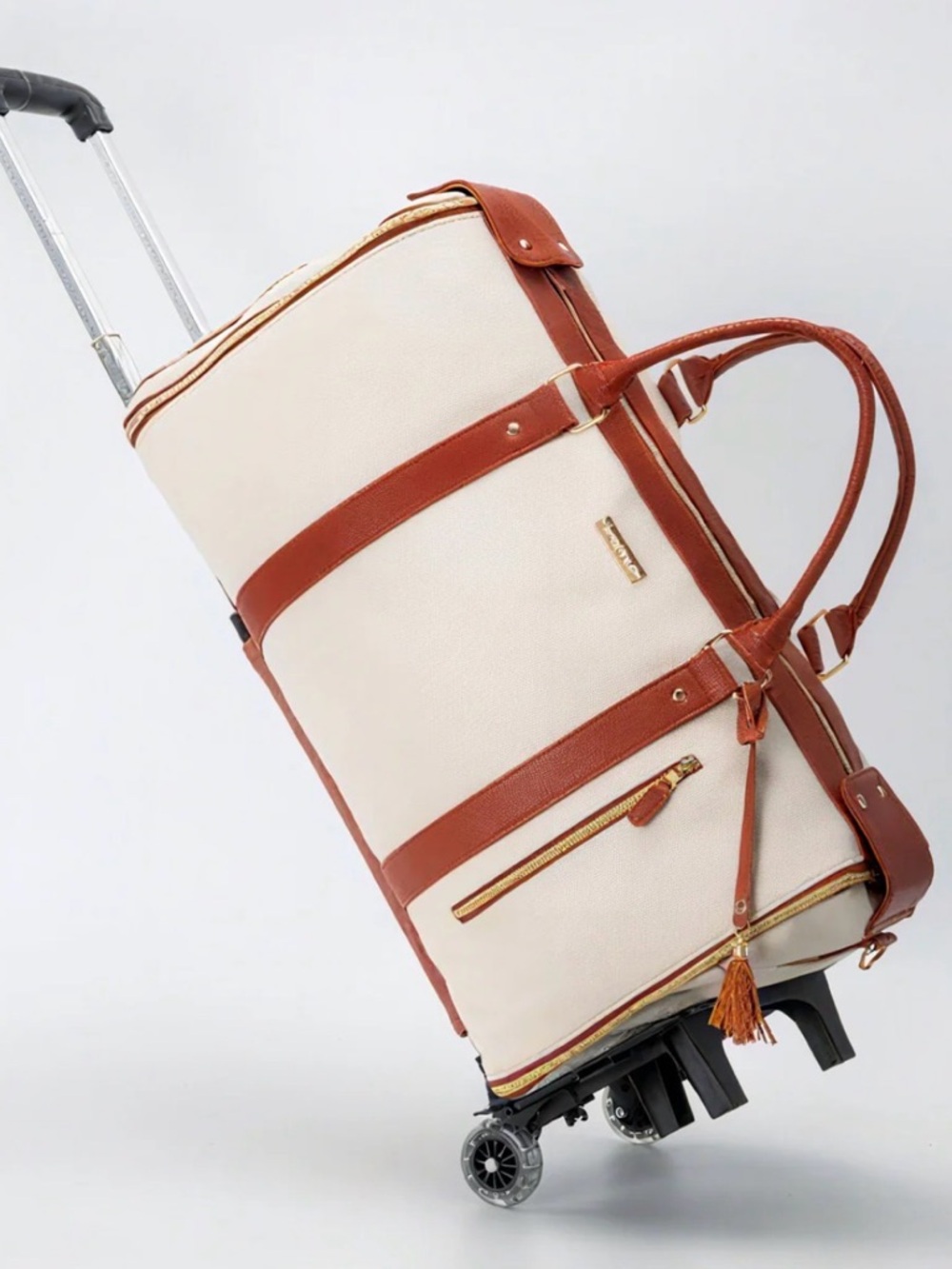 Luxe Cream and Brown Rolling Duffel Bag for women and men. NEW